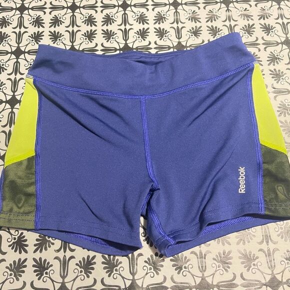 Reebok
- Girls purple / neon yellow spandex shorts - Picture 1 of 6